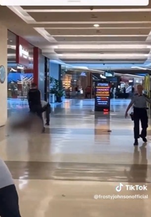 Video shows what appears to be a knife laying on the floor of the shopping centre