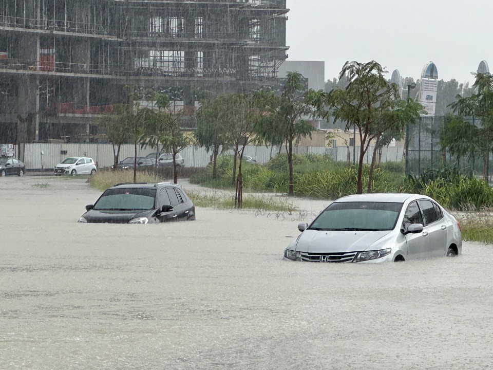 Cars were being engulfed by the floodwater and deserted in the roads