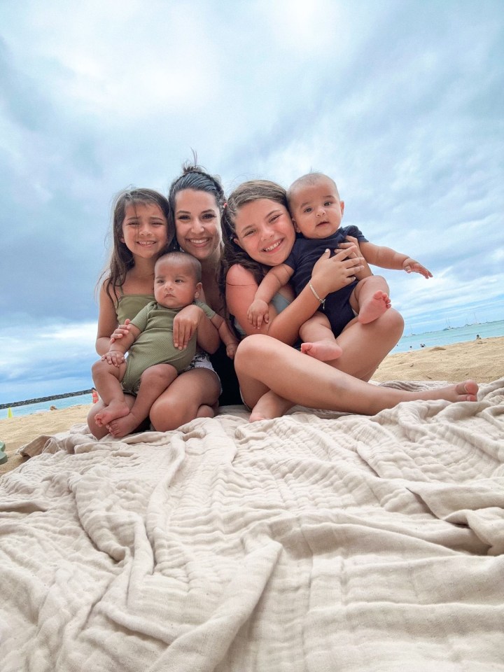 Jenna with her two eldest biological kids Sophia, nine, and Isabella, seven and the 'twins'