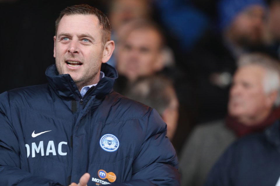 Peterborough chairman Darragh MacAnthony thinks McKenna is good enough for a top club