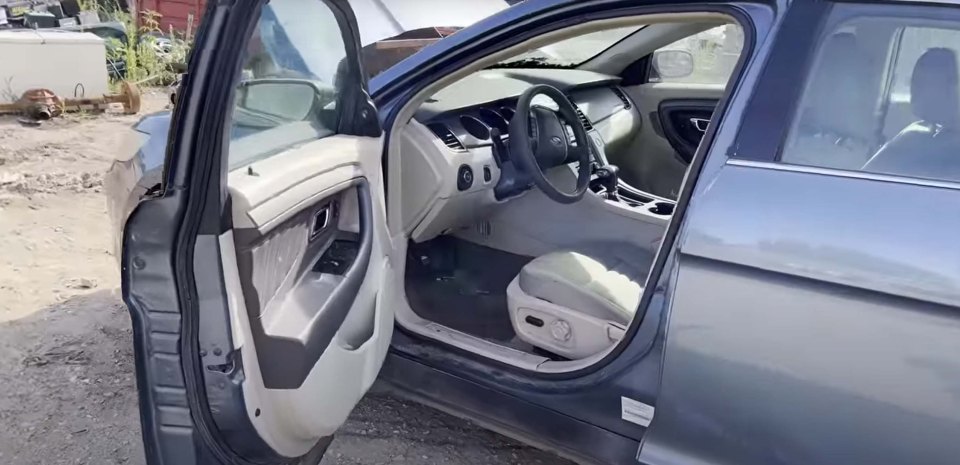 An old Taurus car was dropped off at the scrapyard