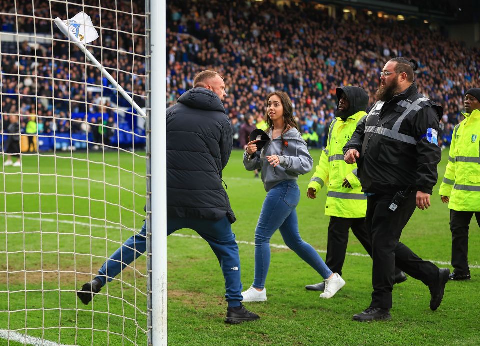 A fan was seen wielding a corner flag