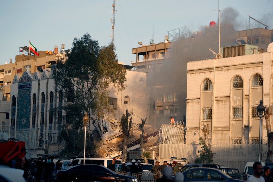 Emergency crews working at the site in Damascus