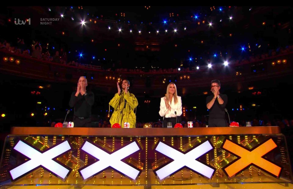 The judges were all on their feet