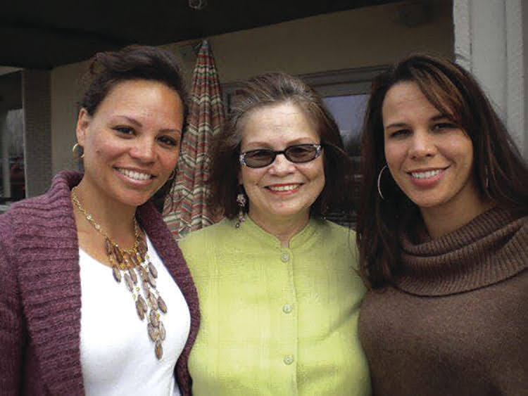 Lana, left, and Natalie, right, are pictured with their mum Donna-Gail, centre