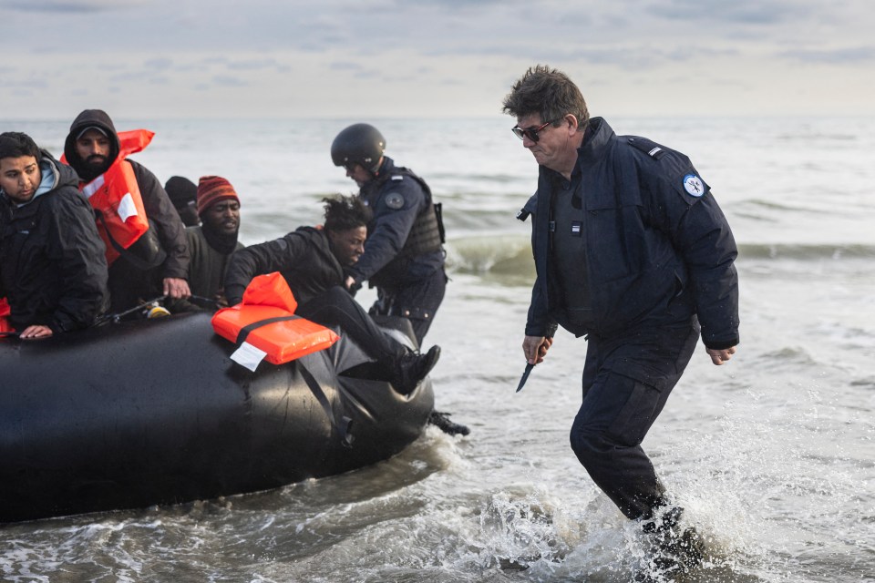 French police officers puncture smuggler’s boat with a knife