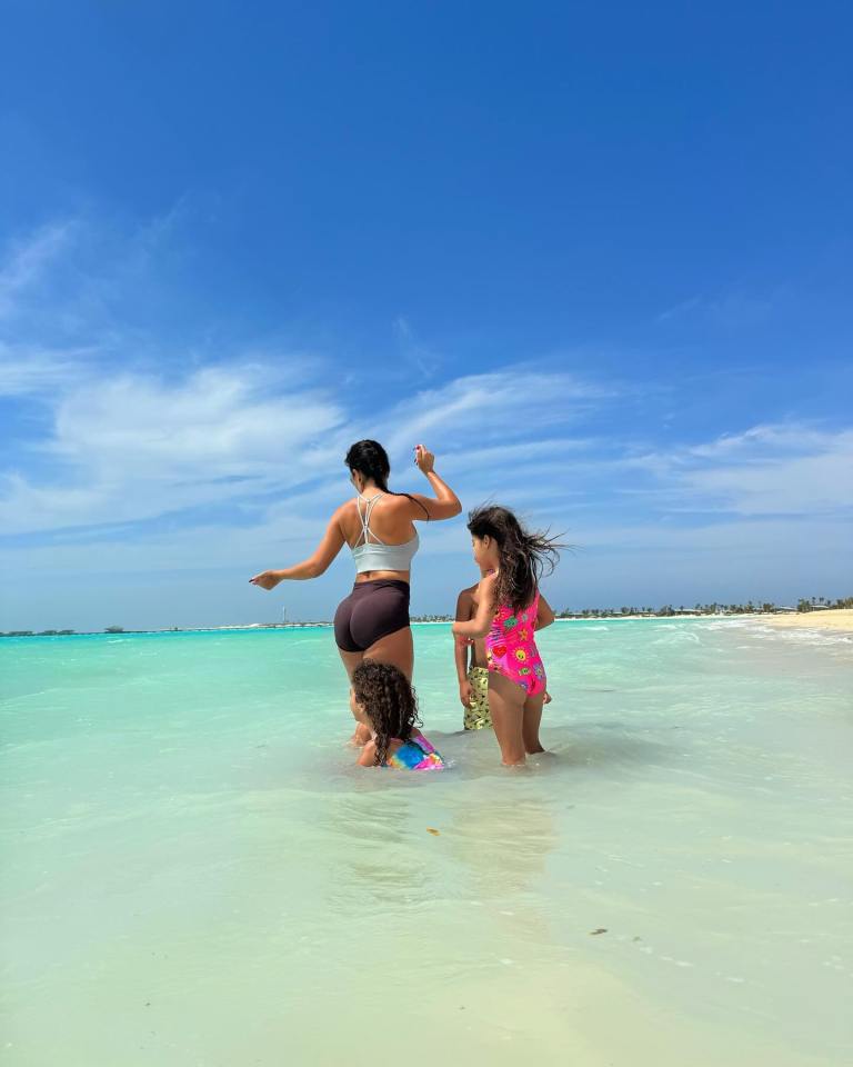 Georgina flaunted her physique as she took a dip in the sea