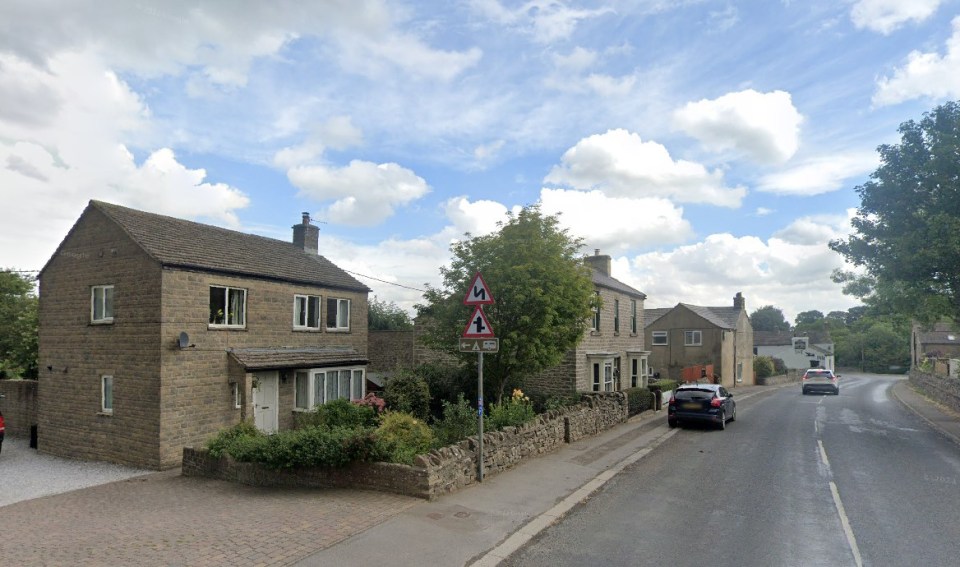 The waterfall can be found down a walkway next to a small housing estate