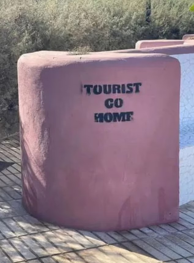 Graffiti telling tourists to 'go home'