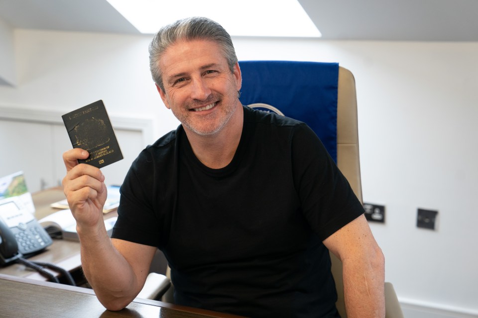 Gypsy billionaire Alfie Best clutches his well worn passport ahead of shock move