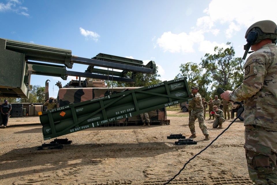 US forces adjusting ATACMS for loading on to the High Mobility Artillery Rocket System (HIMARS)