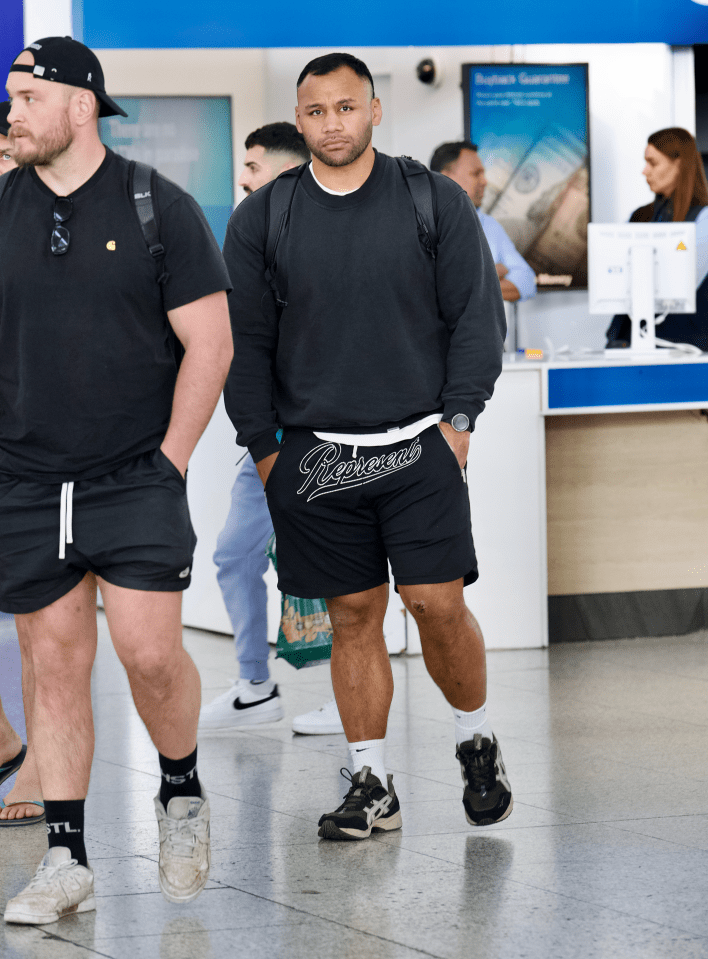 The Sun's exclusive pictures show Vunipola wandering through the airport