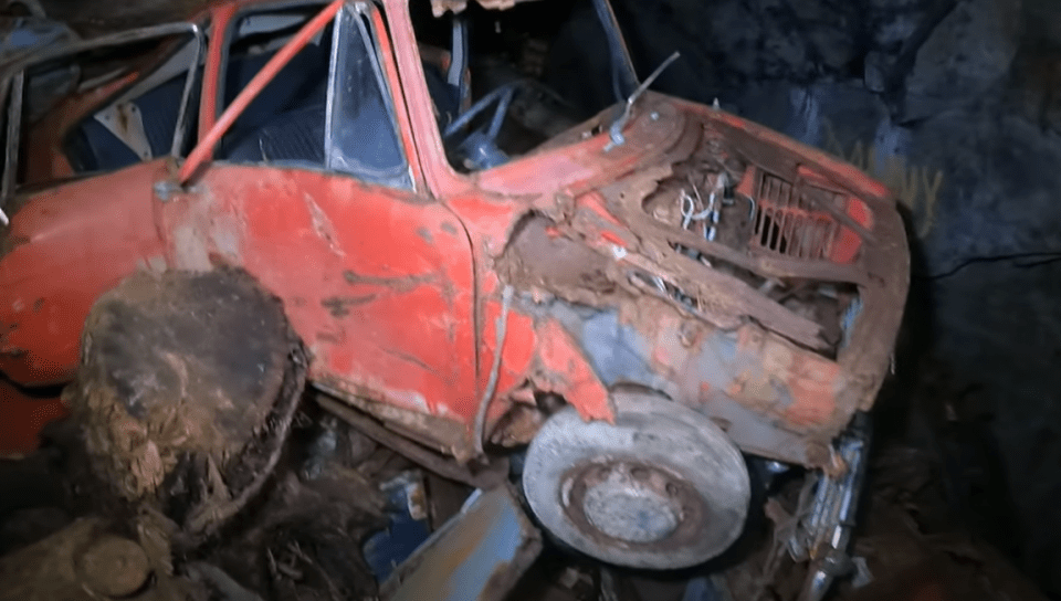 It remains a mystery how all the cars ended up in the empty cavern