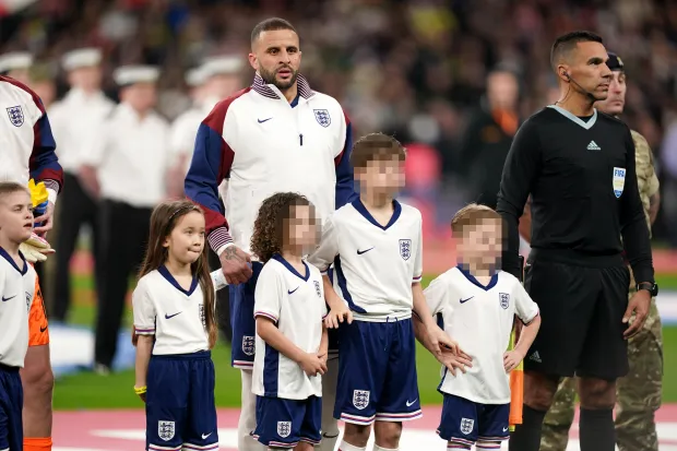 England’s Kyle Walker with three of his kids with Annie, right, ahead of an international friendly match at Wembley Stadium last month