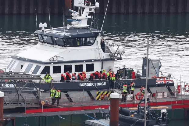 Asylum seekers disembarking at Dover