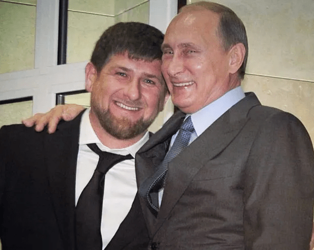 Kadyrov and Vladimir Putin pictured cosying up and beaming