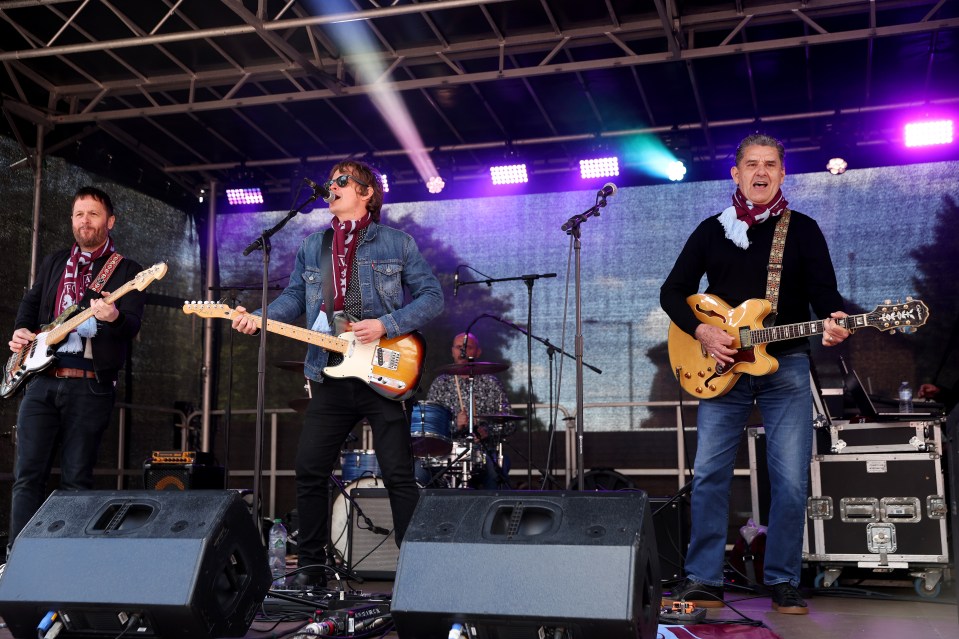 The retired boss played on a fan zone stage with a band