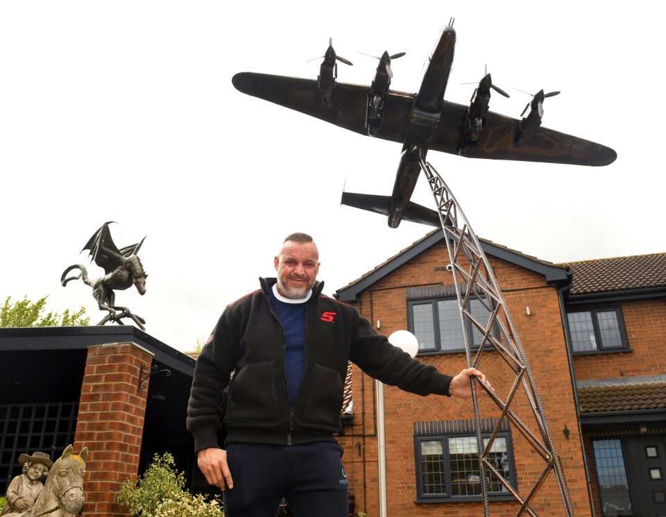 Lincolnshire man Lee Morris has decorated his front garden with statues