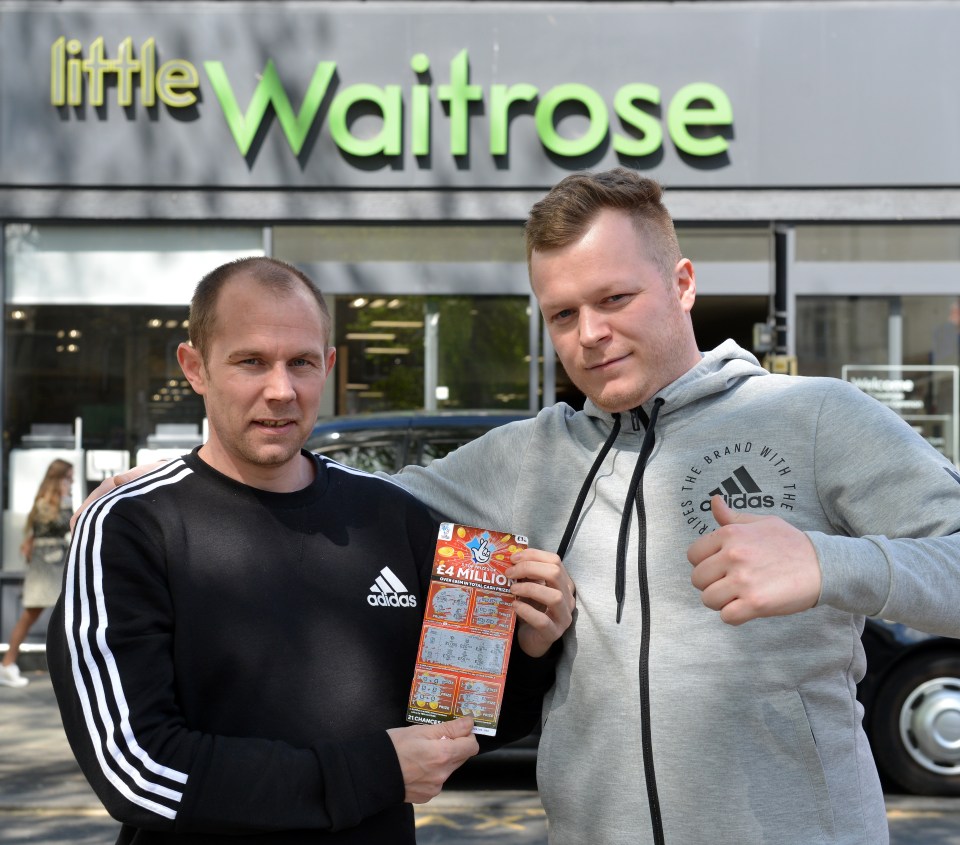 Mark Goodram (left) and Jon-Ross Watson (right) with the winning ticket