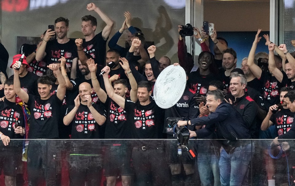 Alonso and his players celebrate Bundesliga glory after Sunday’s 5-0 defeat of Werder Bremen dethroned Bayern Munich after 12 years