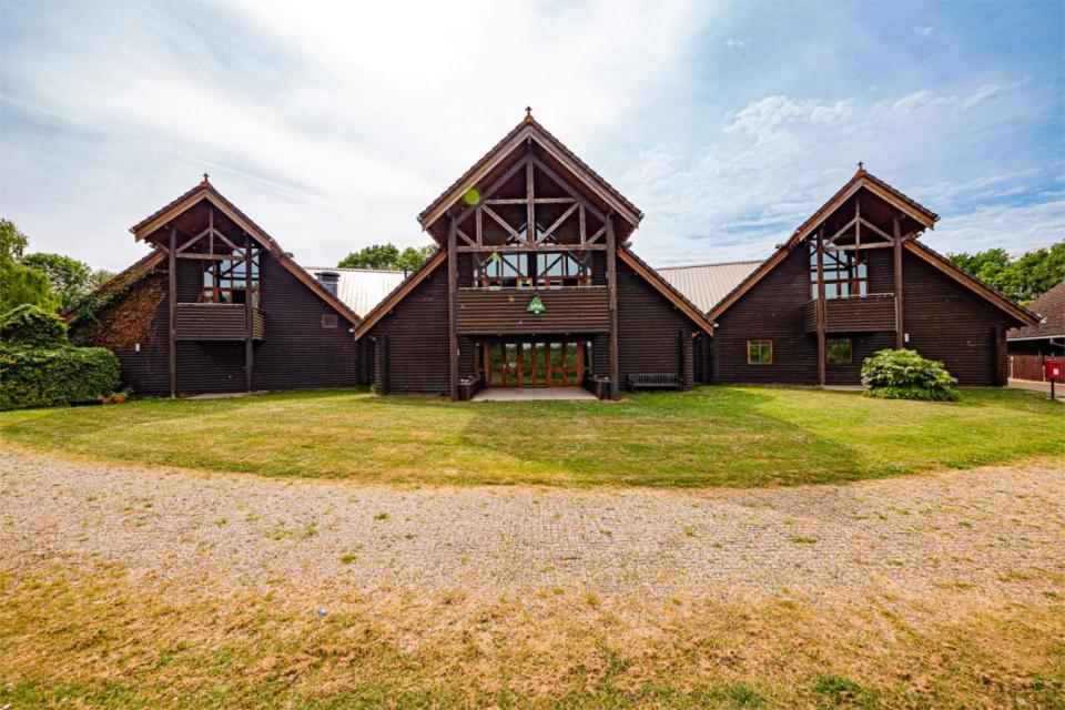 The hostel is based in half a dozen wooden lodges by the lakes at a country park just north of London