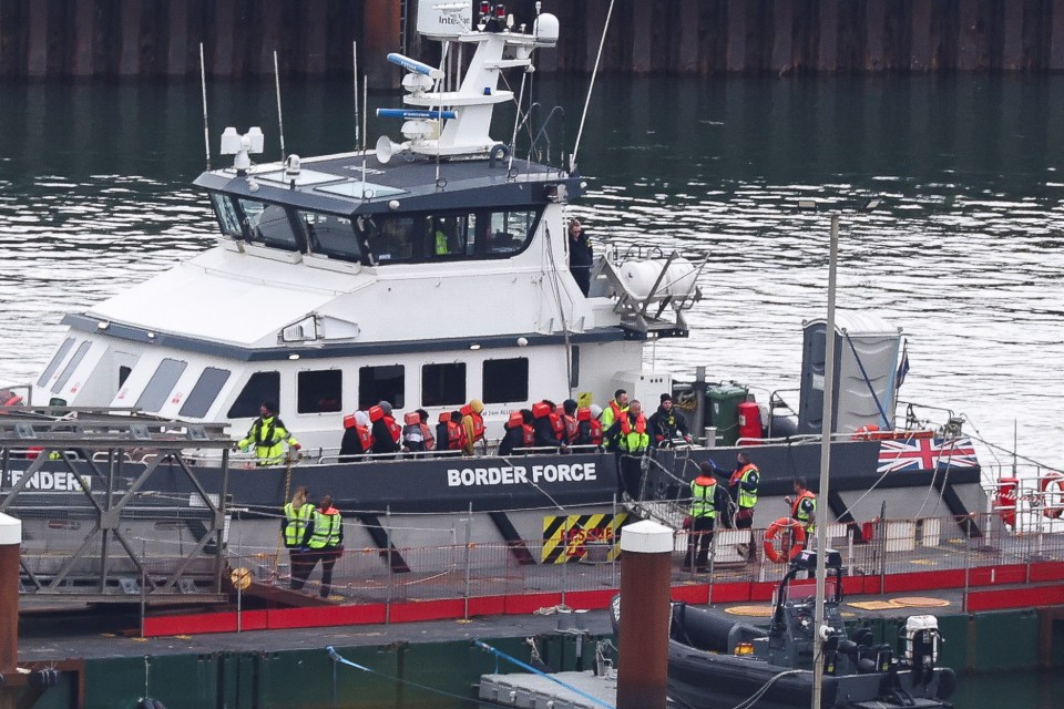 Asylum seekers disembarking at Dover