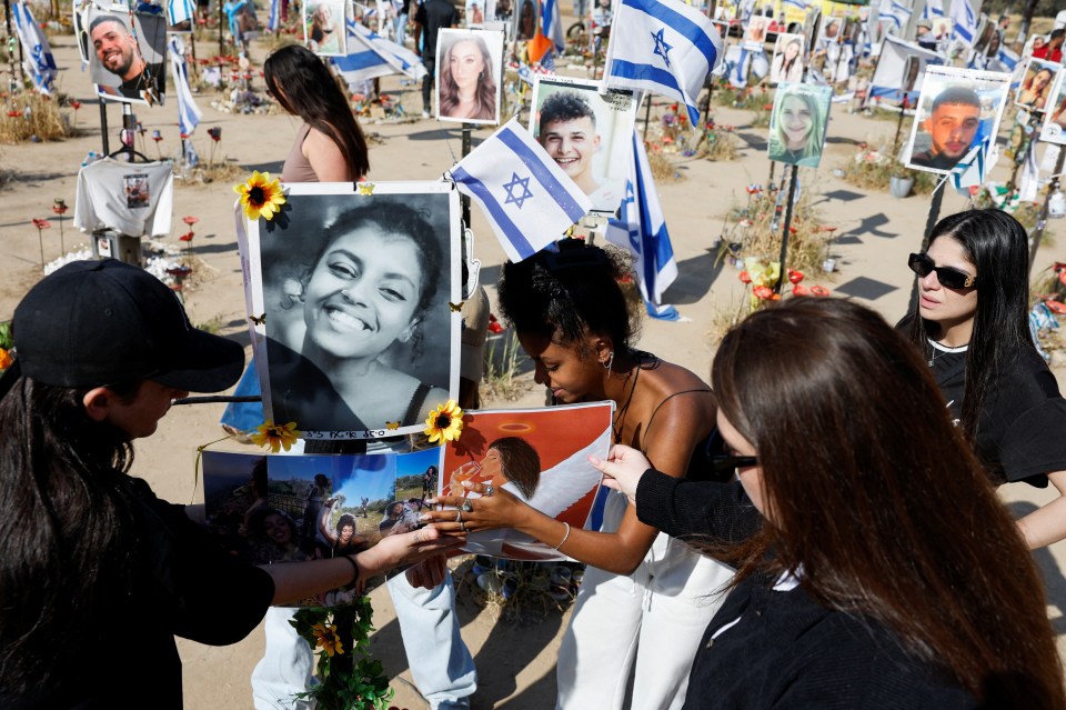 People visit the site of the Nova festival - six months after the deadly October 7 attack