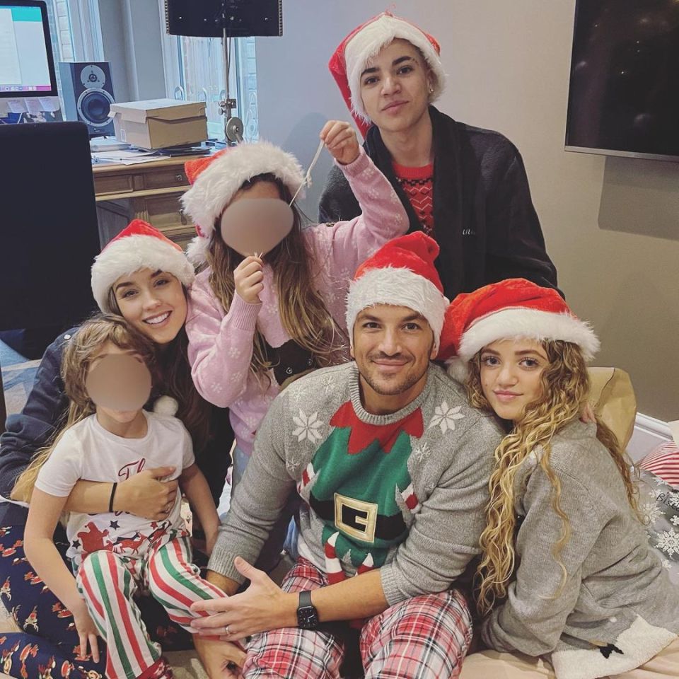 Junior pictured with his dad Peter and sister Princess with Peter's wife Emily and their kids Theo and Amelia