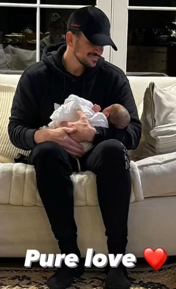 Peter with new daughter