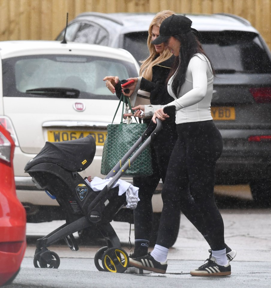 Kyle Walker's wife Annie Kilner was seen pushing her newborn in a pram today