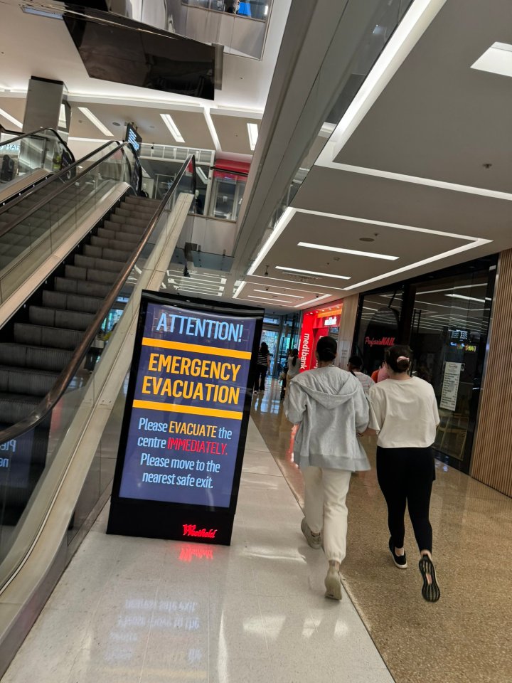 Terrified shoppers flee the scene of the suspected stabbing