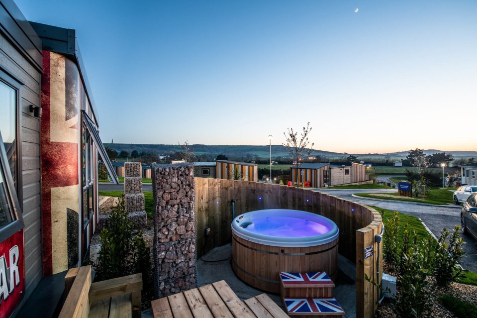 The lodges have their own private hot tub and furnished decking area