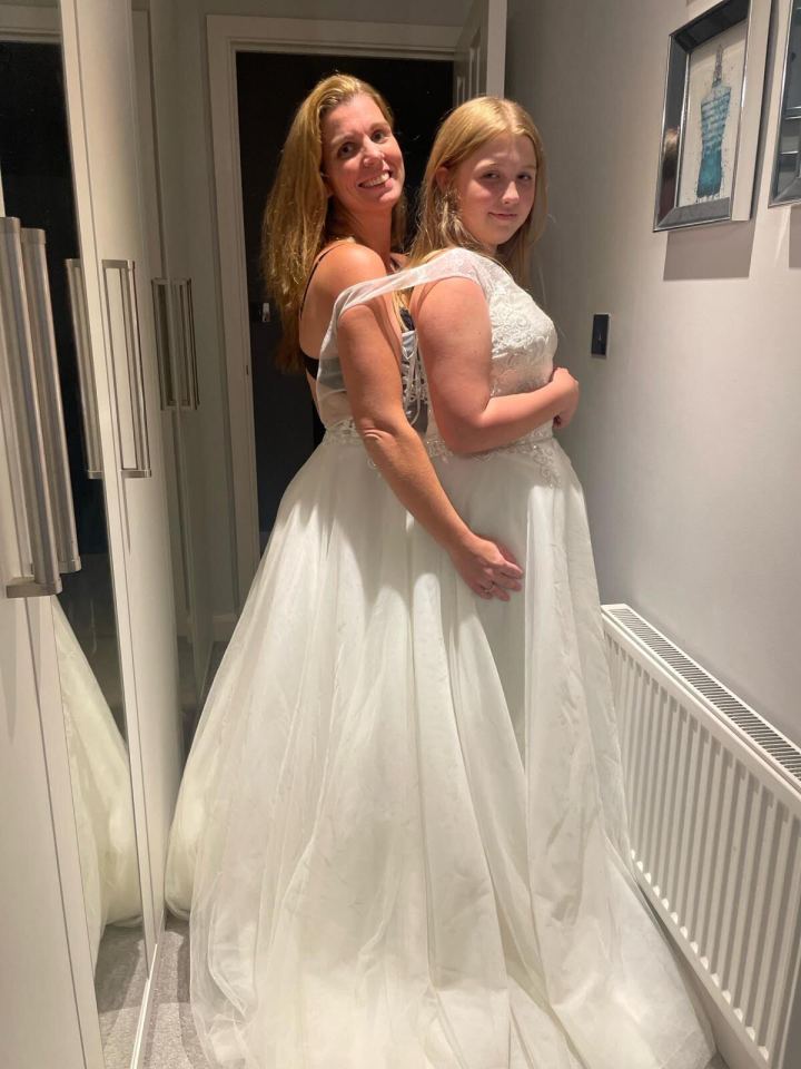 Natalie able to fit into her old wedding dress along with her daughter Evie, 14