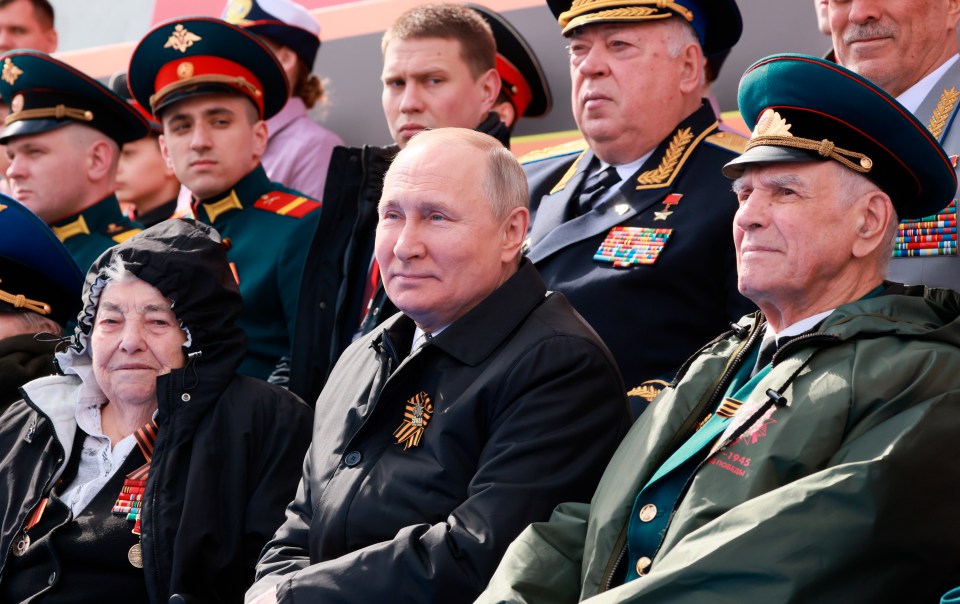 A smug looking Putin at Victory Day in 2022 - just months after his invasion of Ukraine