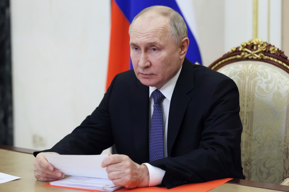 Russian President Vladimir Putin pictured chairing a Security Council meeting at the Kremlin on April 5