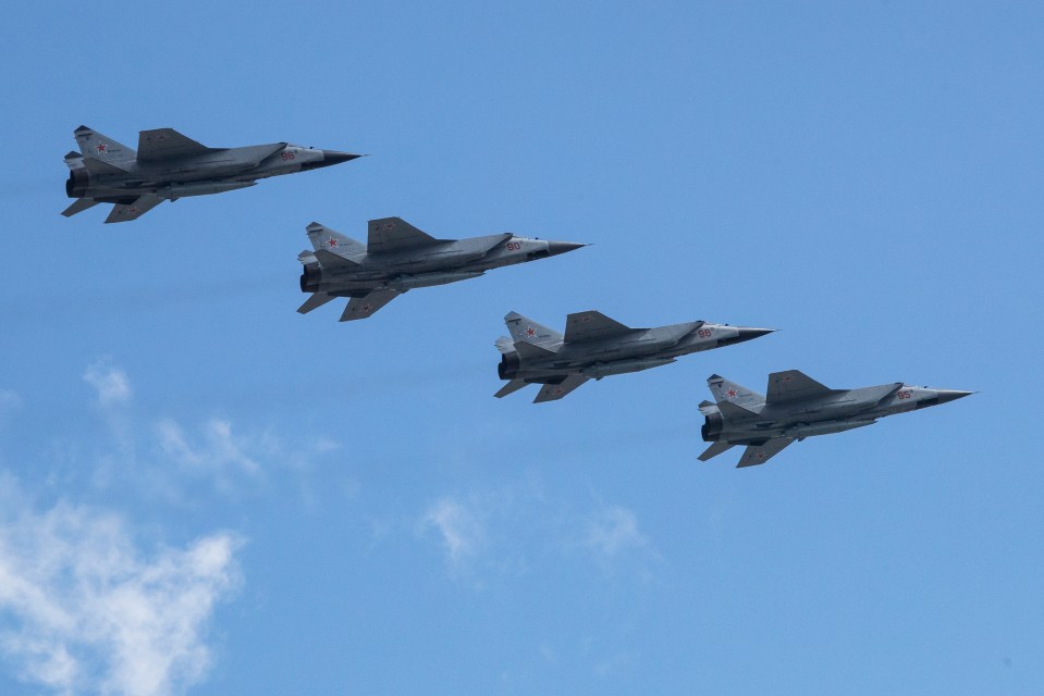 Russian's Air Force Mikoyan MiG-31K jets carrying Kh-47M2 Kinzhal nuclear-capable air-launched ballistic missiles fly over Red Square