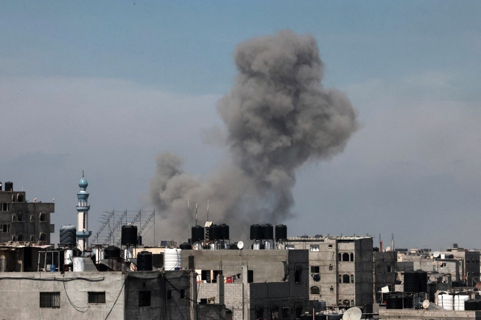 Smoke billows during Israeli strikes on Rafah in the southern Gaza Strip on April 9