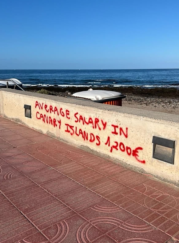 A guerilla graffiti campaign by locals has seen scrawled slogans targeting tourists