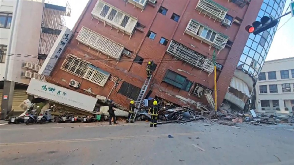 Residents are trapped inside one apartment block that collapsed in the quake