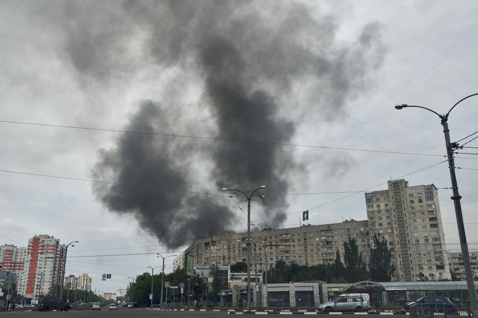 Clouds of smoke rise above Kharkiv as Russian forces bombard the city in what experts called a feint