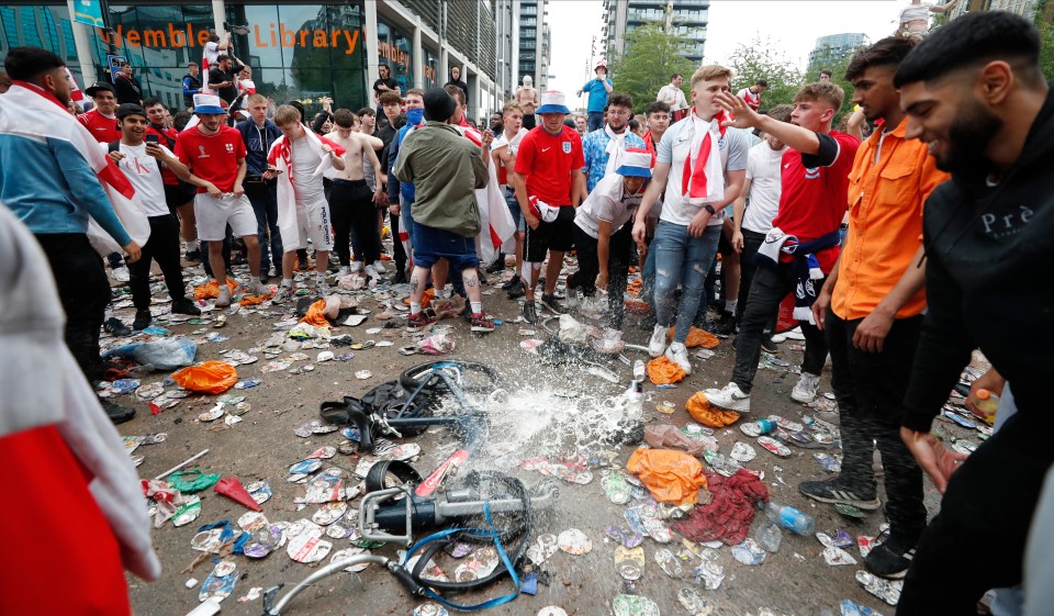 Officials compared scenes to 'like a warzone' due to the amount of debris and broken glass around the stadium