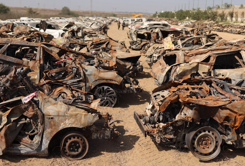 Rows of vehicles lay damaged following the October 7 Hamas attacks