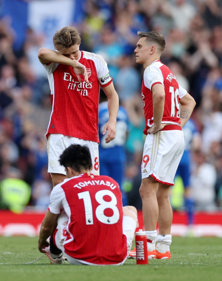 Captain Martin Odegaard was helpless as Man City claimed the title