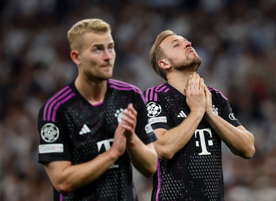 De Ligt and Kane look on in shock after the game