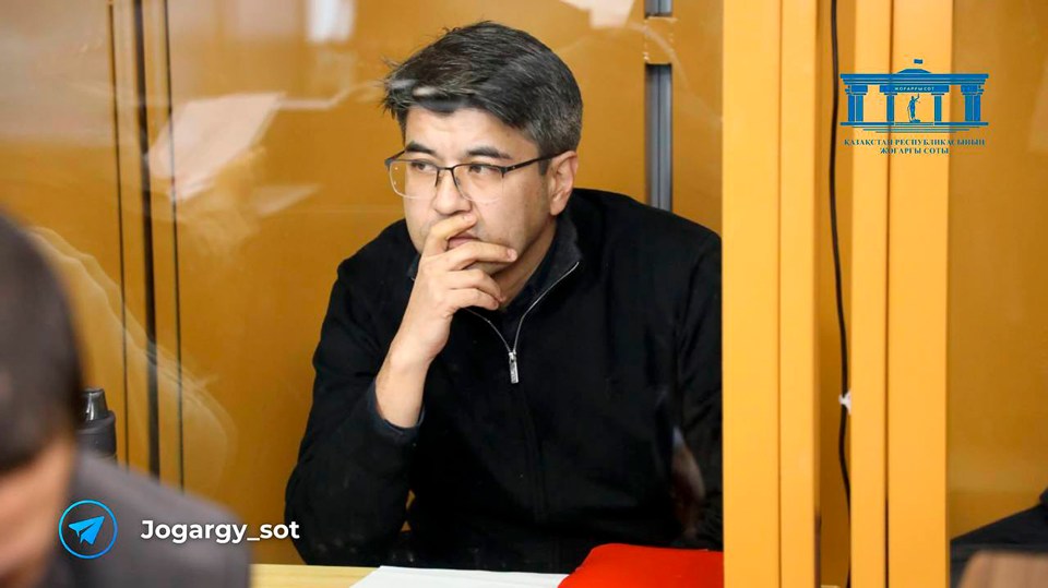 Kazakhstan businessman Kuandyk Bishimbayev, 44, sits in a defendants’ cage at his trial