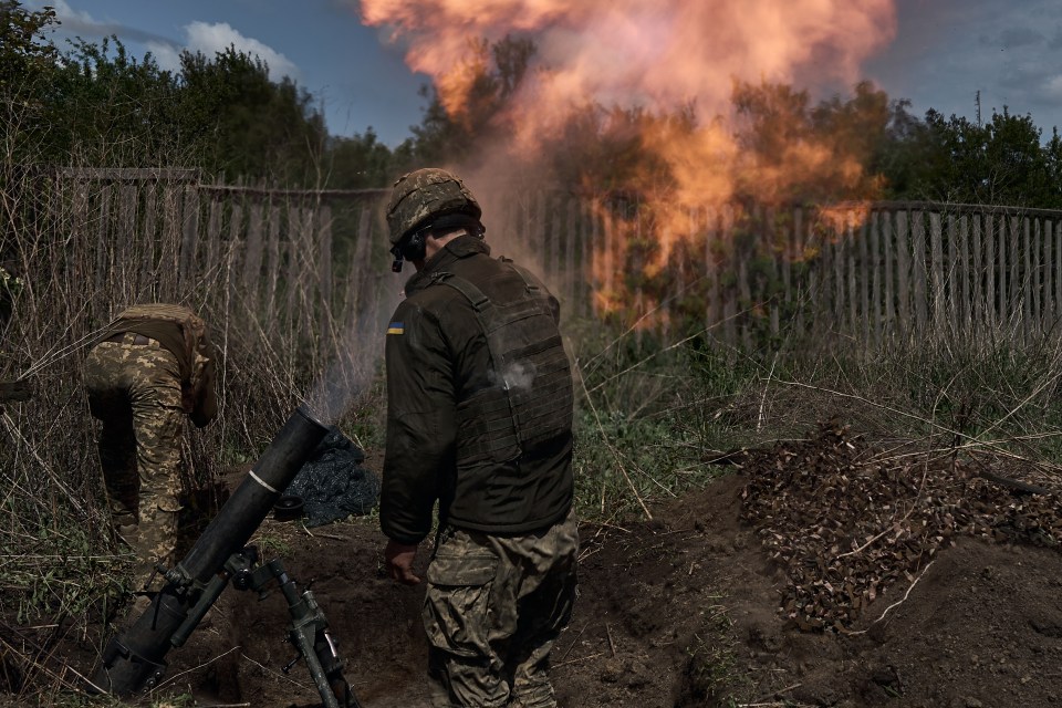 Ukrainian soldiers in Kharkiv, where the war rages on