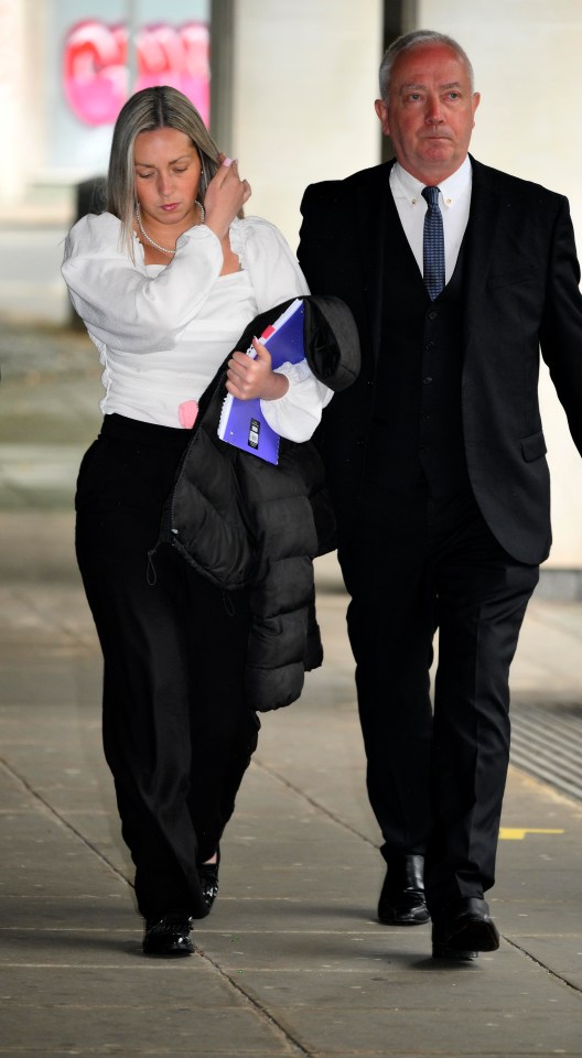 Rebecca Joynes clutched a purple notepad arriving at court