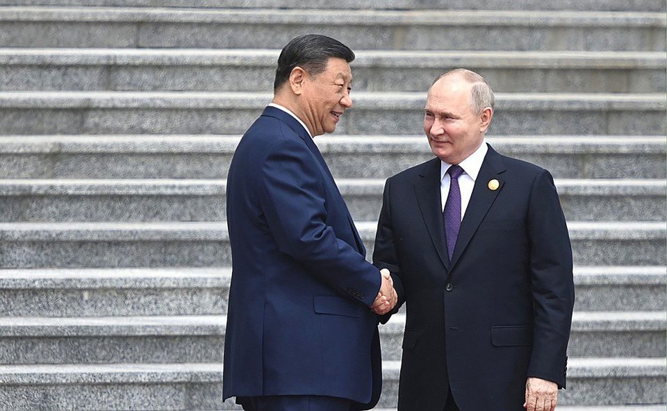 Vladimir Putin and Xi Jinping rubbed shoulders at a summit on Thursday