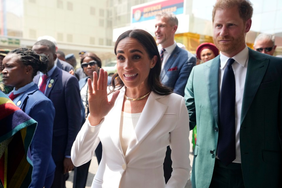 Prince Harry and Meghan visit army wives at the Defence headquarters in Abuja, Nigeria