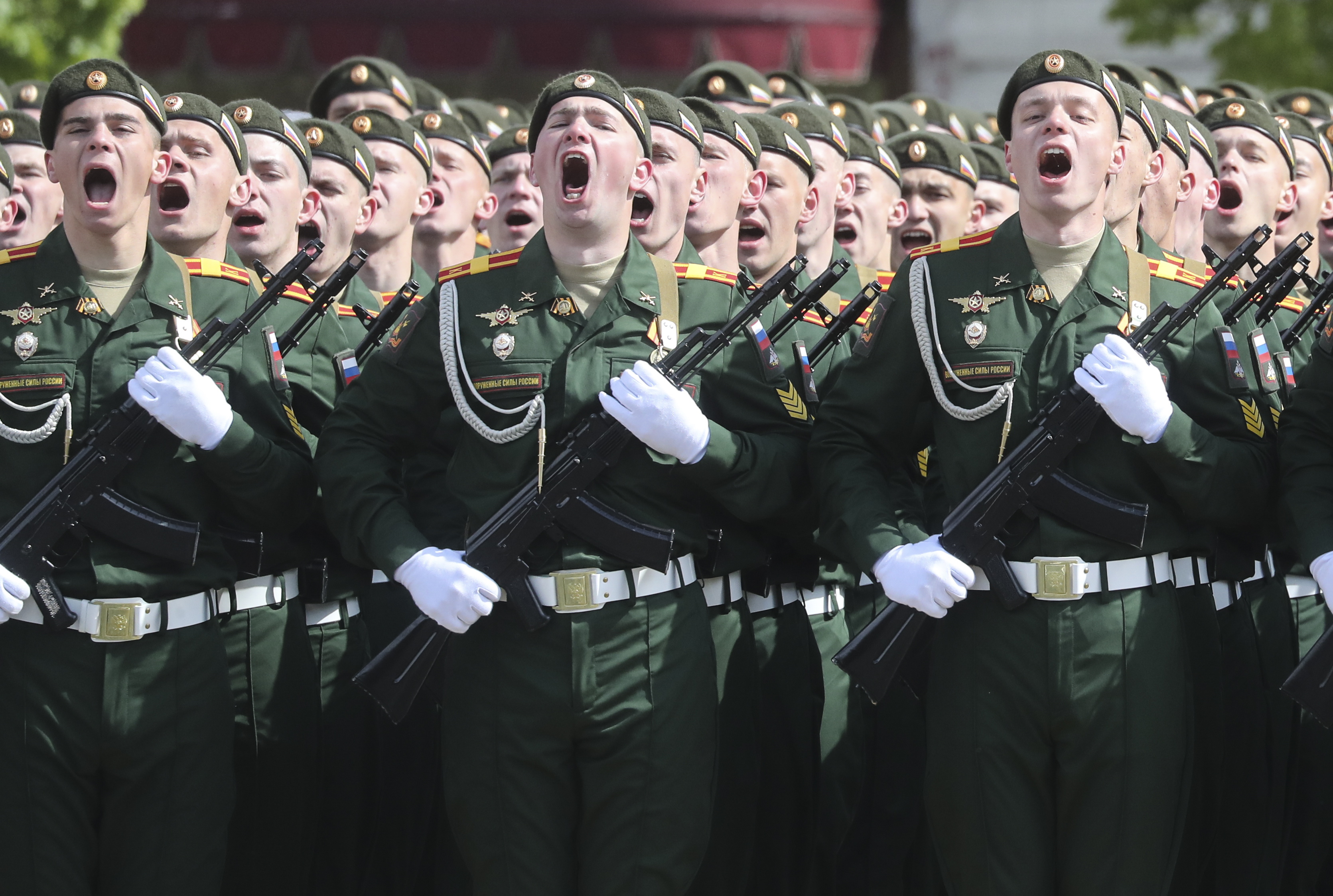 Troops sing on the 79th anniversary of the defeat of Nazi Germany